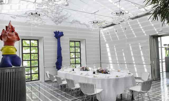 Sophisticated meeting space at Widder Hotel with elegant round table and natural light.