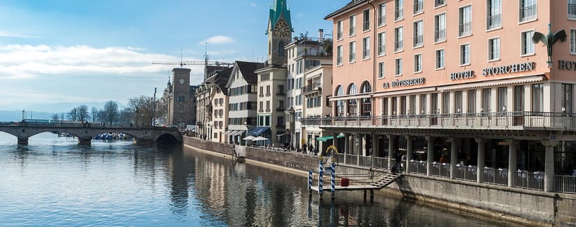 Restaurant with riverfront view in Hotel Storchen Zurich for outdoor events and gatherings.