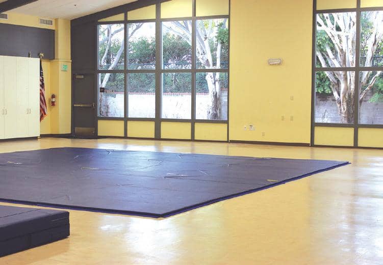 Spacious Manhattan Beach auditorium with natural light for meetings and events.