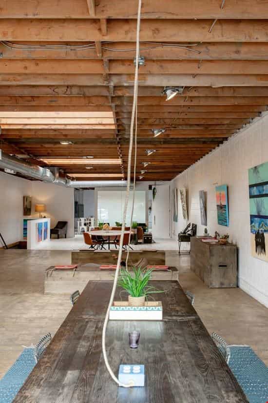 Versatile event space in El Segundo with polished concrete floors, ideal for workshops and meetings.