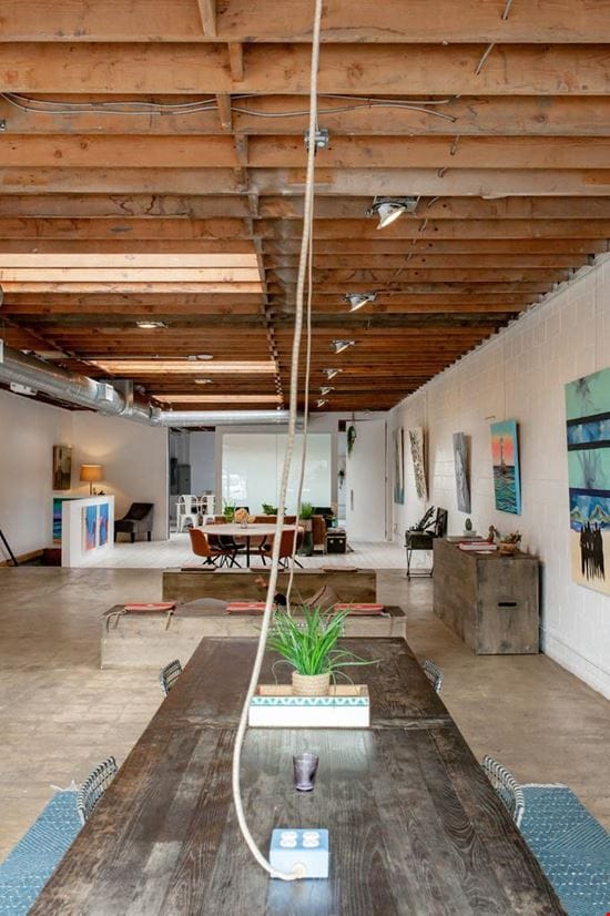 Versatile event space in El Segundo with polished concrete floors, ideal for workshops and meetings.