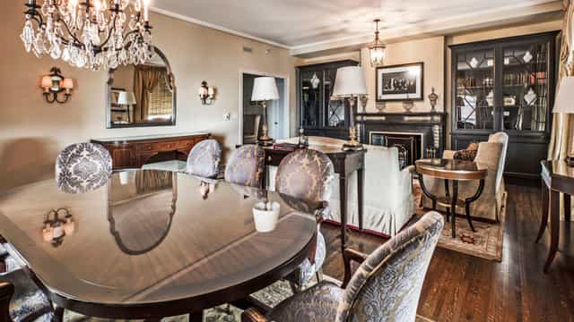 Sophisticated boardroom with elegant dining table for upscale meetings and events.