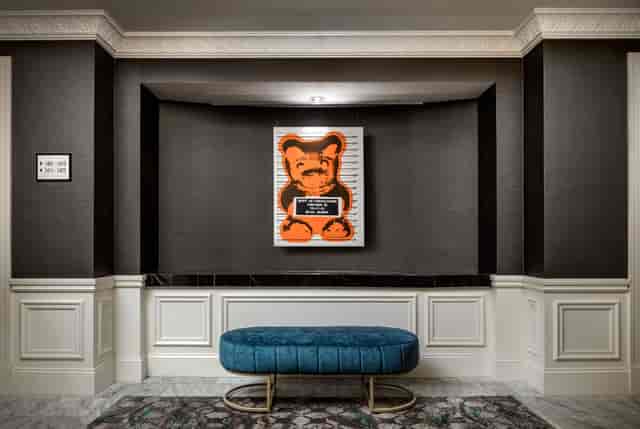 Inspiration Studio lobby with striking orange artwork, ideal for networking events.