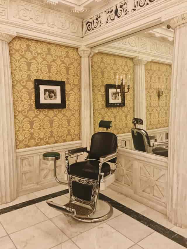 Stylish vintage barbershop with classic chair, perfect for networking events and personal grooming.