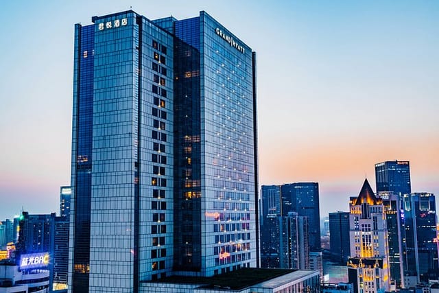 Jin Ma at Hotel Nikko Chengdu, sleek skyscraper, modern corporate event venue