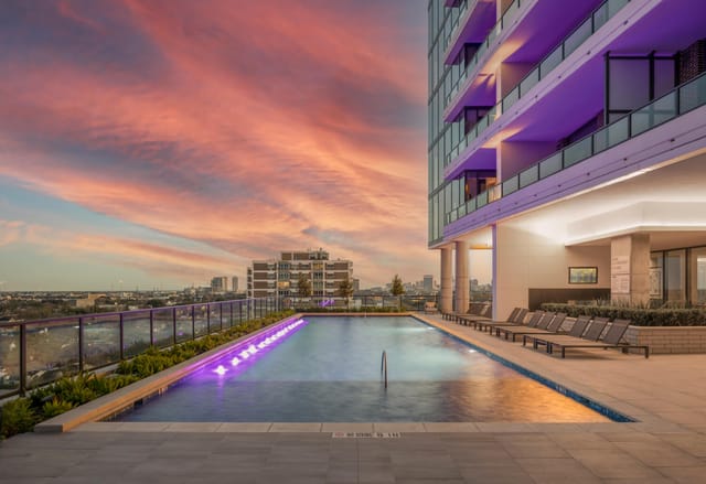 Rooftop venue at Tower Gallery with pool and sunset, perfect for upscale events.