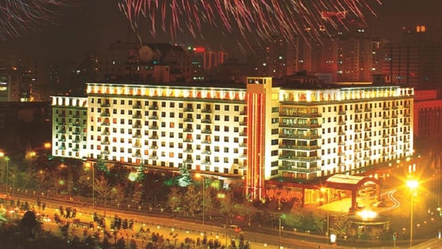 Dignitary Hall at Sichuan Jin Jiang Hotel, illuminated venue for elegant events.