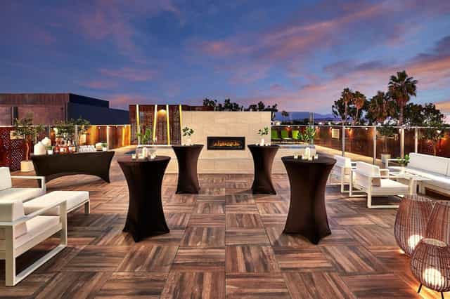 Elegant rooftop event space with modern furniture for cocktail receptions, SpringHill Suites.