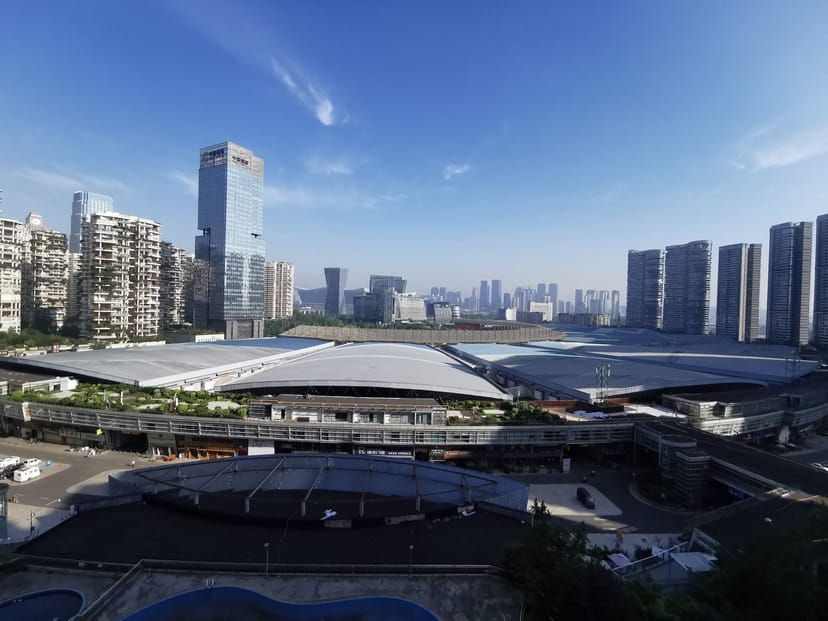 Chengdu Convention Center with sleek curved roof, perfect for expos and conferences.