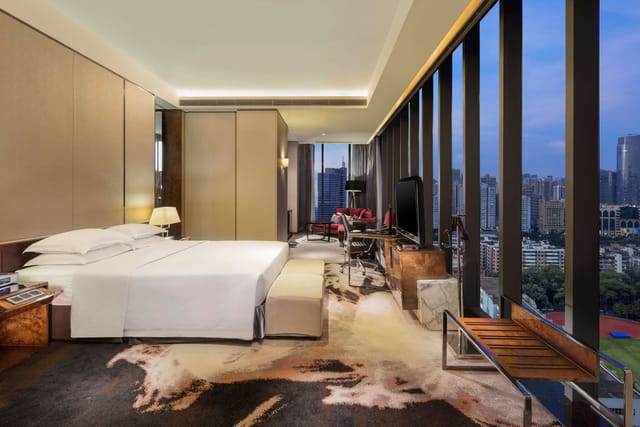 Modern meeting room in Hilton Guangzhou Tianhe with city views for business travelers.