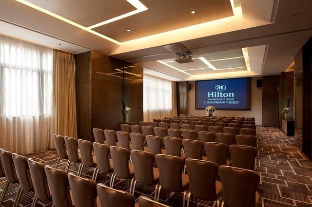 Conference Hall at Hilton Guangzhou Tianhe, spacious venue for corporate meetings and events.