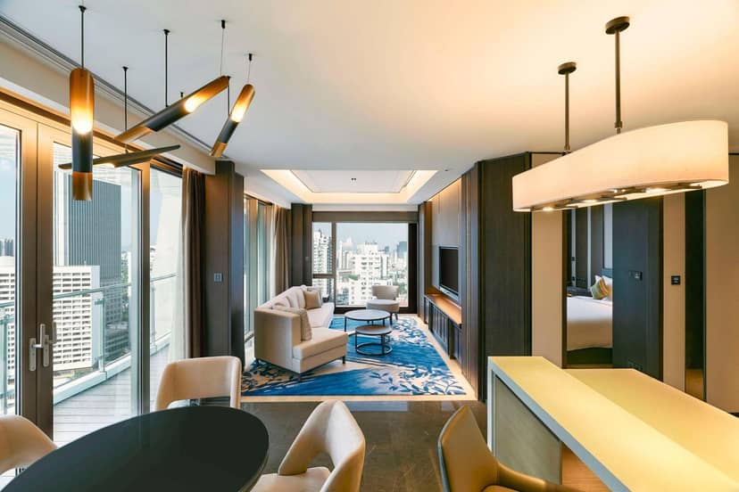 Elegant hotel suite in Kempinski Residences Guangzhou for meetings and relaxation.