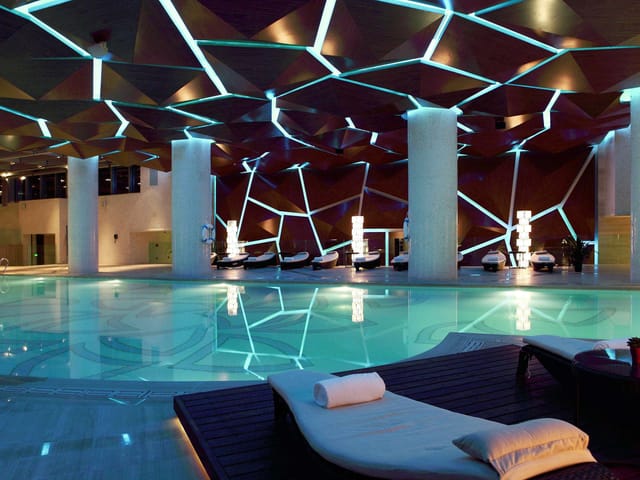 Sofitel Guangzhou Salle Delacroix, modern event space with sleek pool for upscale gatherings.