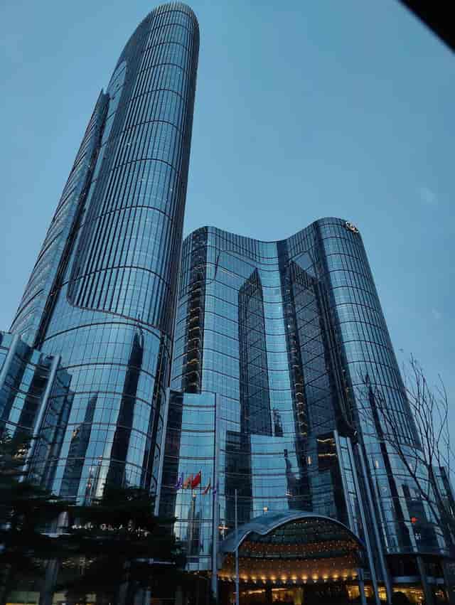 Sleek modern skyscraper Salon Renoir, reflective glass facade for corporate events and meetings