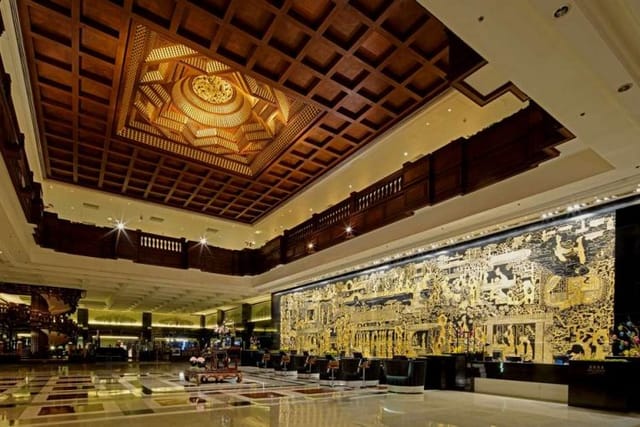 Garden Hotel function room with ornate ceiling, ideal for upscale events and meetings.