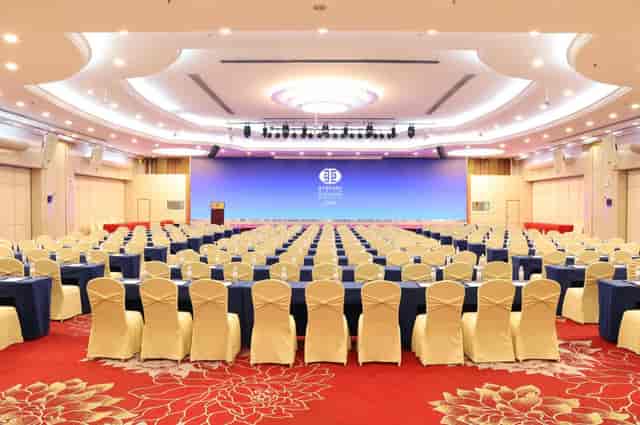 Meeting Room at Guangdong Hotel, elegantly arranged for conferences and events.