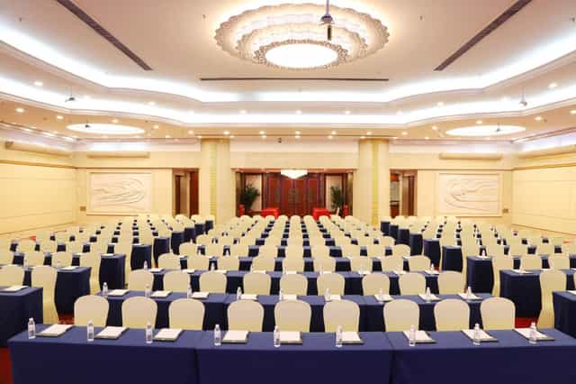 Elegant Guangdong Hotel meeting room for large conferences with organized seating.