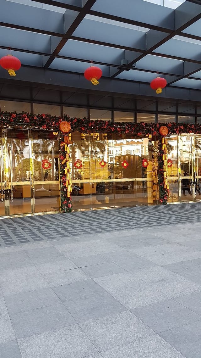 Elegant entrance of Peninsula International Banquet Hall, perfect for holiday gatherings.