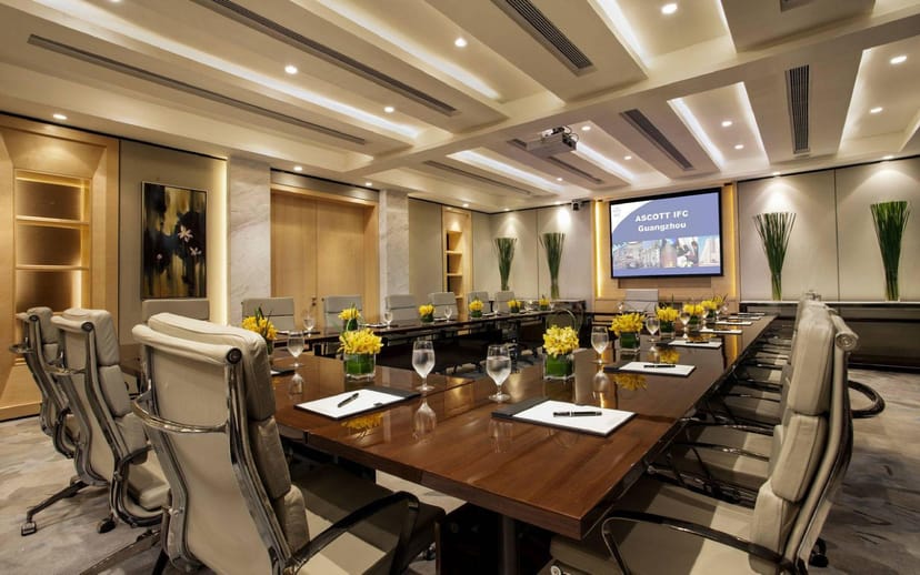 Meeting Room 1 in Ascott Guangzhou with a large table, ideal for professional events.