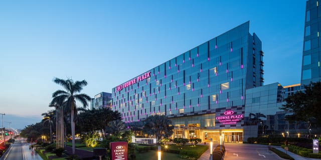 Crowne Plaza Guangzhou Huadu hotel with modern architecture, ideal for business events.