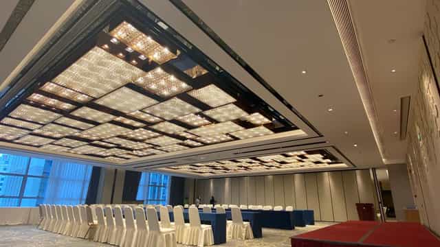 Grand Ballroom at Holiday Inn Guangzhou: modern conference room with elegant ceiling design.