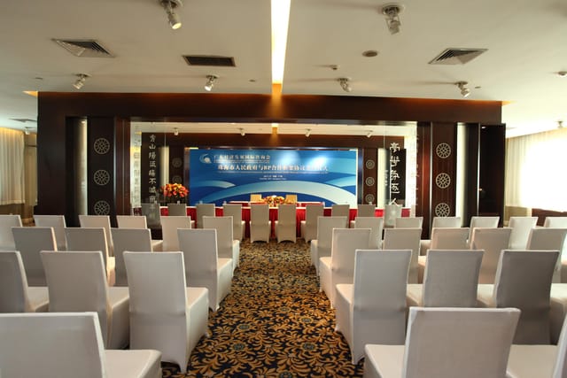 Conference room at Dong Fang Hotel, featuring elegant decor for corporate events.
