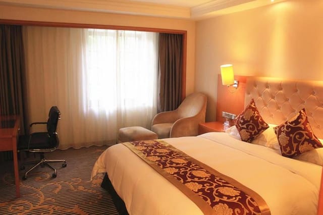 Luxurious hotel suite in Guangzhou Yuehai Hotel, perfect for events or conferences.