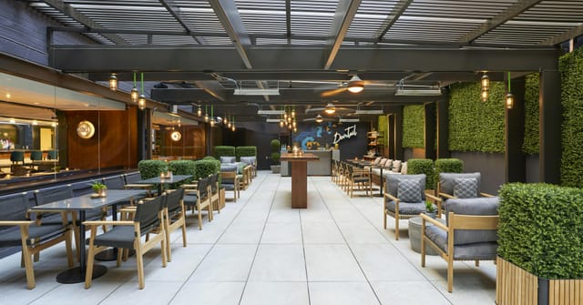 Eckstine Ballroom in Viceroy DC: modern event space with natural light for gatherings.