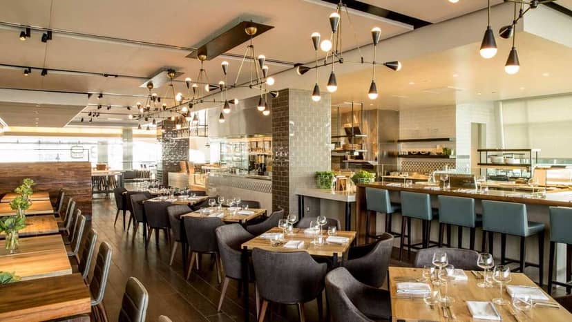 Modern Main Dining Room in STEM Kitchen + Garden, perfect for private events and meetings.