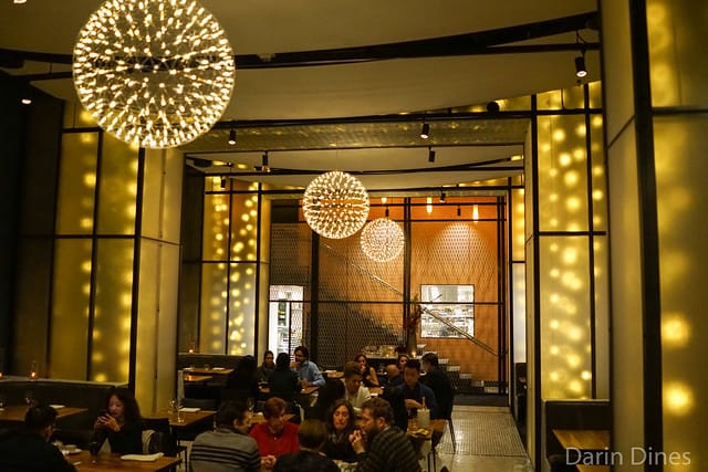 Modern restaurant in Mourad with stylish lighting, ideal for networking events and private dinners.