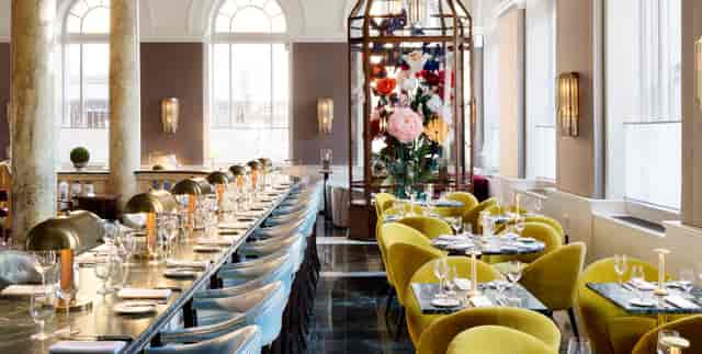 Rooftop dining space at Riggs DC with elegant table, ideal for upscale events and receptions.