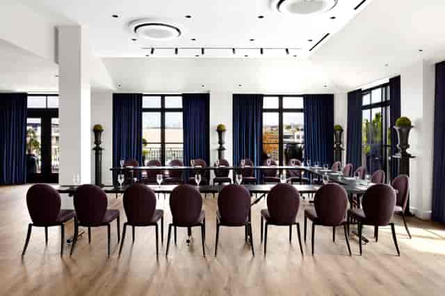 Elegant meeting room at Rooftop at Riggs, ideal for corporate retreats and workshops.