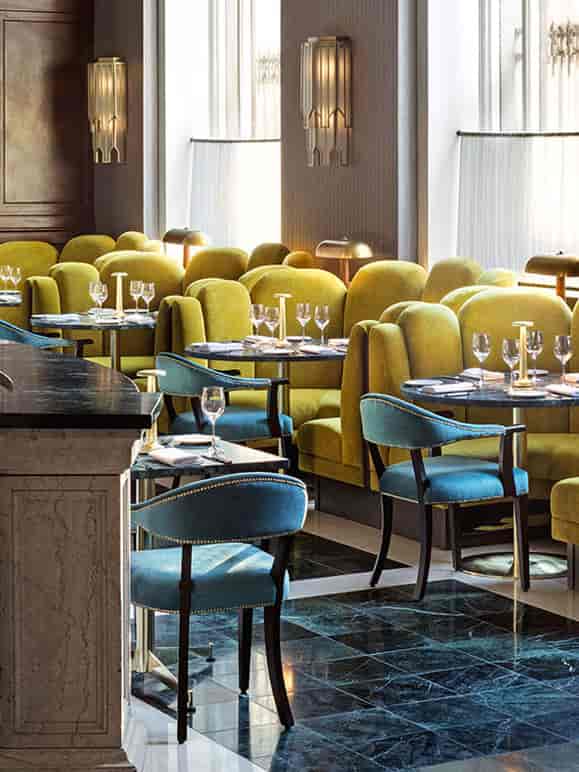 Stylish Zaytinya dining room with vibrant seating for upscale events and gatherings.