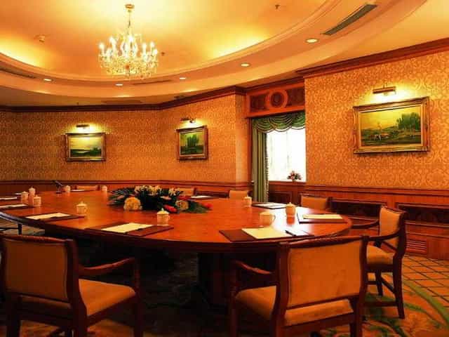Elegant meeting room at GITIC Guangdong International Hotel for board meetings and conferences.
