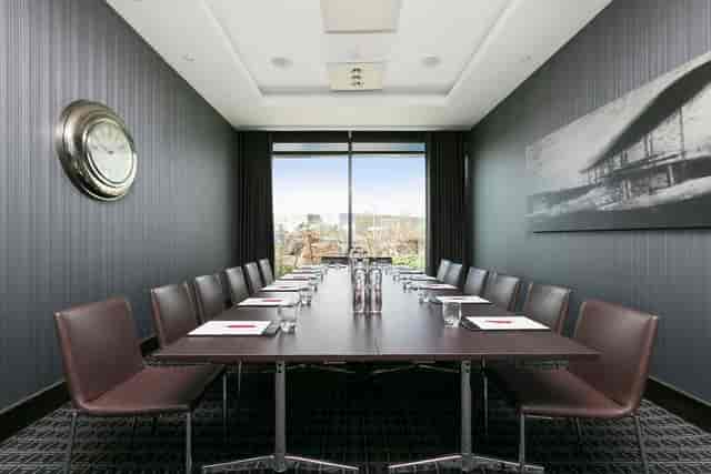 Modern boardroom at Brooklands Hotel, ideal for corporate meetings and presentations.