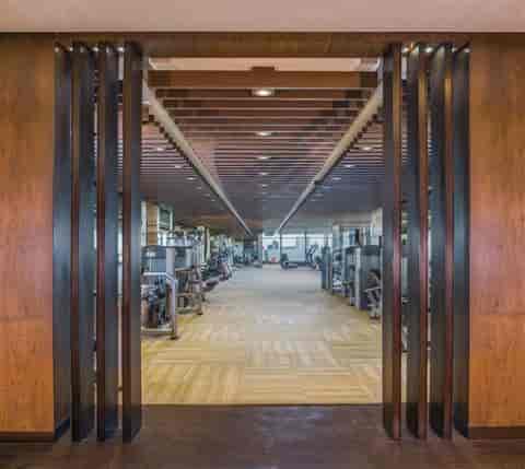 Modern fitness facility at The St. Regis Mumbai for wellness conferences and retreats.