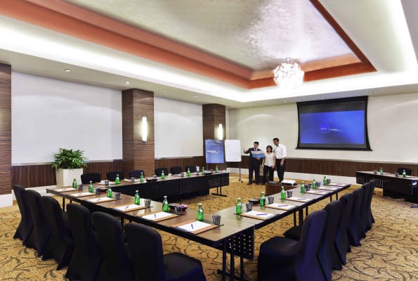 Meeting room at Novotel Mumbai Juhu Beach with U-shaped table for productive workshops.