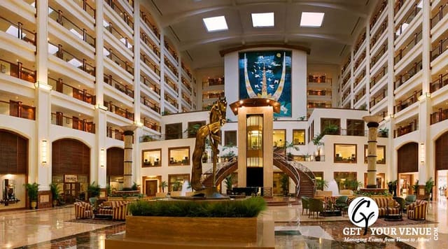 Elegant hotel atrium at The LaLiT Mumbai, ideal for corporate seminars and events.