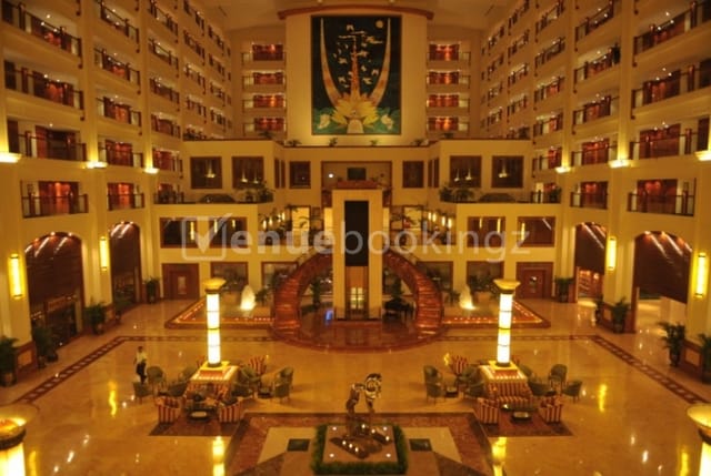 "Elegant hotel lobby at The LaLiT Mumbai for seminars and networking events."