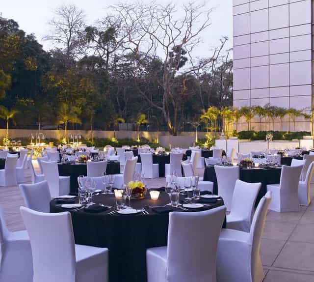 Elegant Westin Grand Ballroom setup for upscale receptions in lush greenery.