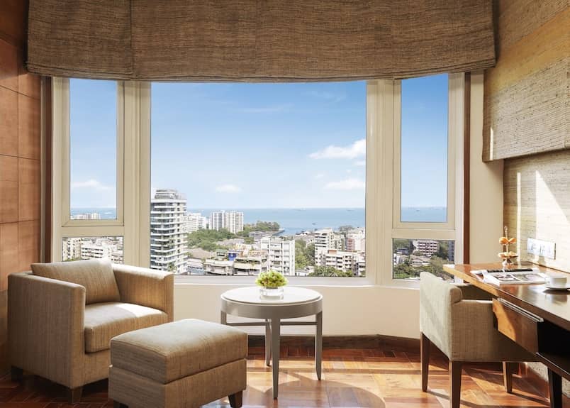 Sophisticated lounge with large windows for creative meetings at Vivanta By Taj President