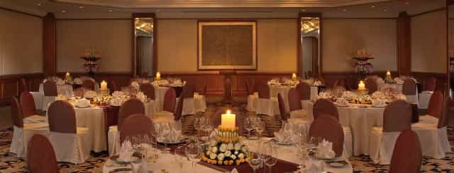 Elegant banquet hall setup in The Leela Mumbai for weddings and corporate events.