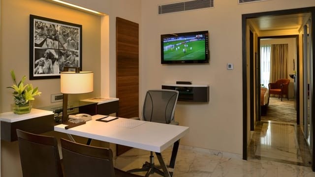 Stylish Marine Plaza meeting room with functional workspace, ideal for work and leisure events.