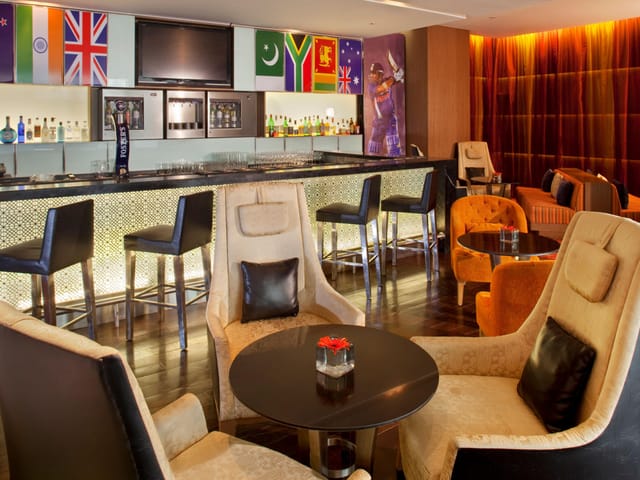 Sky Terrace bar, modern furnishings, ideal for networking events in Mumbai.