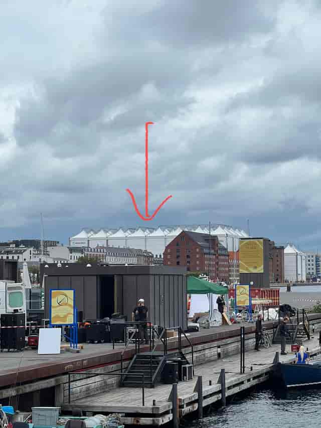 Copenhagen Pride Community Tent with vibrant atmosphere and event setups, urban festivities.