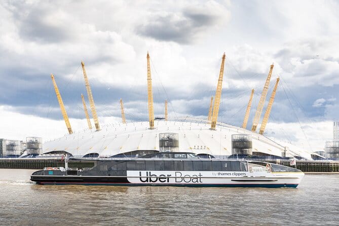 Uber Boat navigating near O2 Arena, showcasing unique event transportation options.