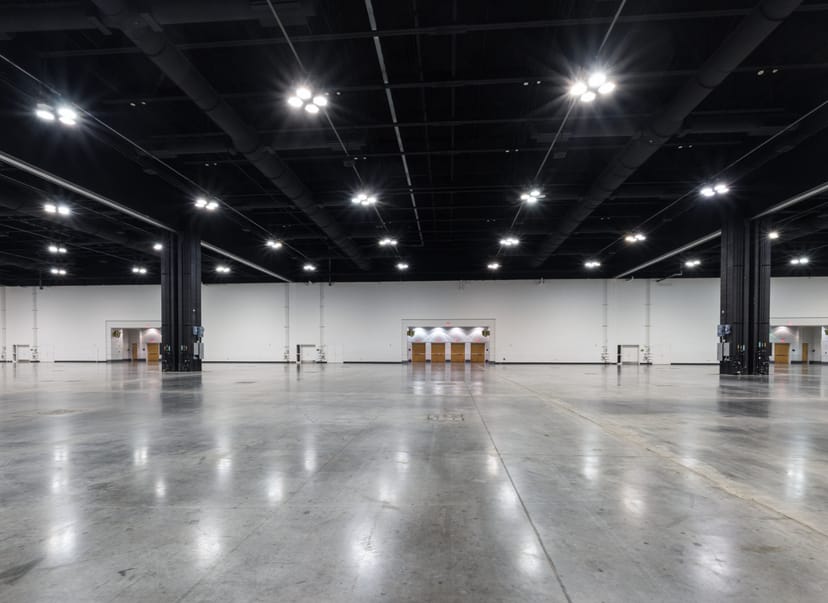 Georgia International Convention Center exhibit hall with polished floors for corporate events.