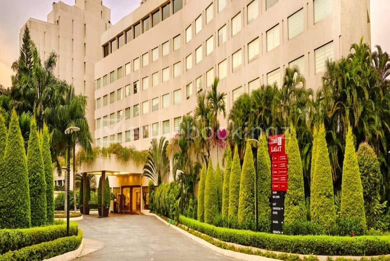 Lush hotel facade at Kalinga, The LaLiT Ashok Bangalore for corporate events.
