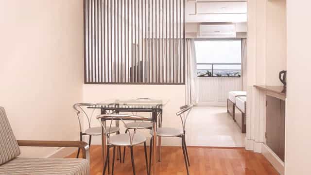 Modern meeting space with glass table in Hotel Ivory Tower, Bangalore for events.