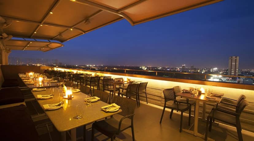 Rooftop dining at Hotel Ivory Tower, Bangalore, perfect for evening events and gatherings.